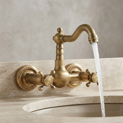 Lagomel wall-mount bathroom faucet in antique brass, set in a Traditional/Classic/Vintage/Retro bathroom