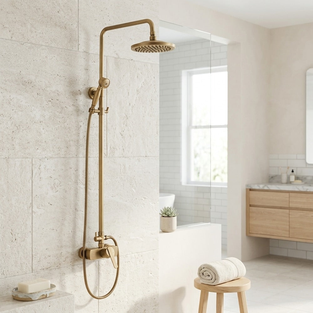 Lagomel wall-mounted single-handle complete shower system in antique brass, set in a Traditional/Classic bathroom