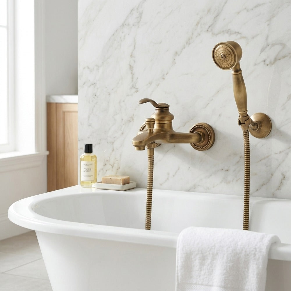 Lagomel single-handle wall-mount tub filler in antique brass, set in a Traditional/Classic/Vintage/Retro bathroom