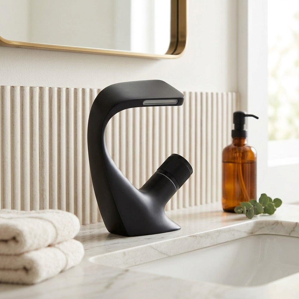 Lagomel waterfall single-hole bathroom faucet, set in a Modern/Minimalist bathroom