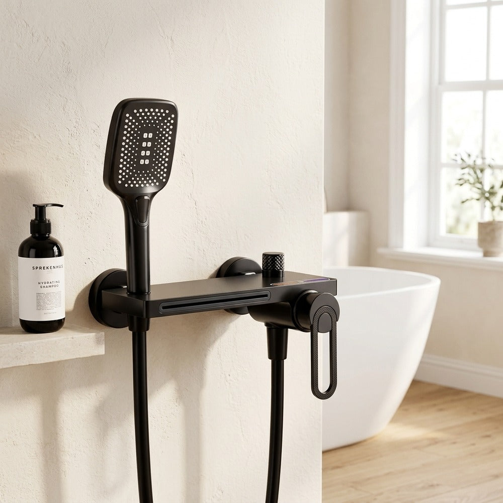 Lagomel waterfall single-handle wall-mount tub filler, set in a Modern/Minimalist bathroom
