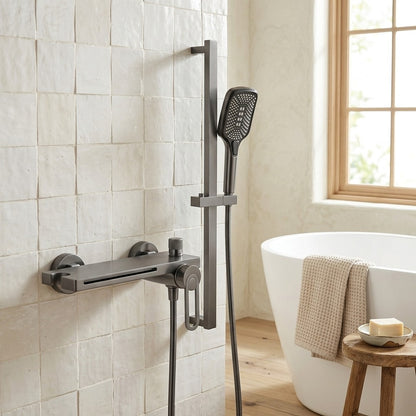Lagomel waterfall single-handle wall-mount tub filler, set in a Modern/Minimalist bathroom