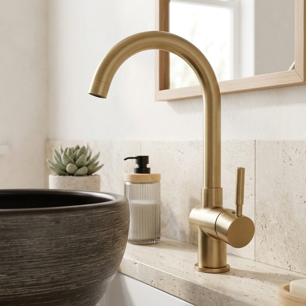 Lagomel single-handle vessel sink faucet in antique brass, set in a Traditional/Classic bathroom