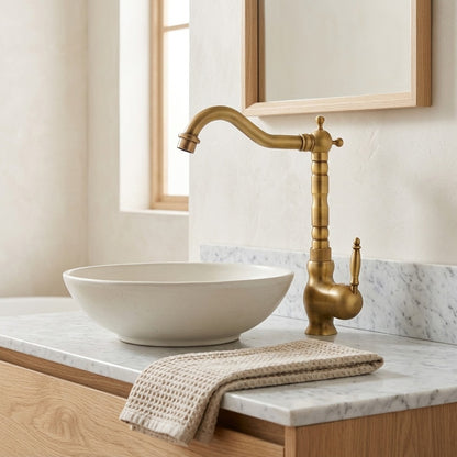Lagomel single-hole single-handle vessel sink faucet, set in a Modern/Minimalist/Contemporary bathroom