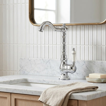 Lagomel single-handle vessel sink faucet in antique brass, chrome, polished gold, set in a Traditional/Classic/Vintage/Retro bathroom