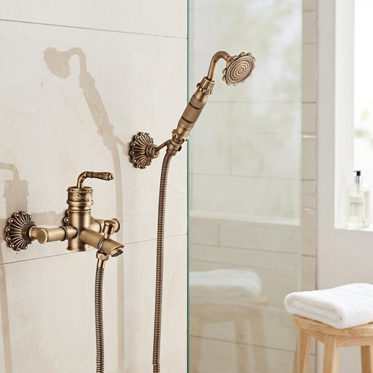 Lagomel wall-mounted single-handle tub and shower system in antique brass, set in a Traditional/Classic/Vintage/Retro bathroom