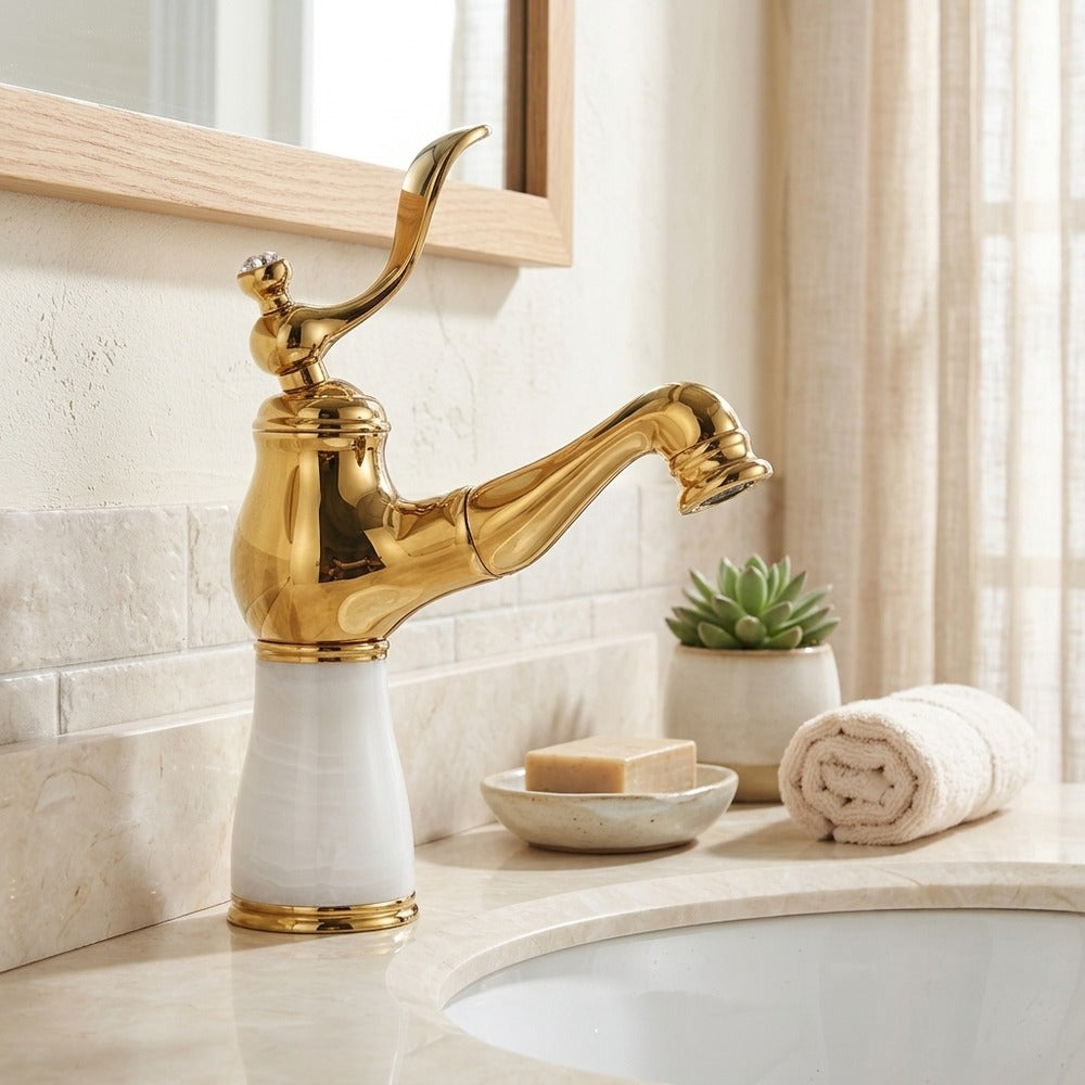 Lagomel single-hole bathroom faucet in polished gold, two-tone / mixed finish, set in a Traditional/Classic/Vintage/Retro bathroom