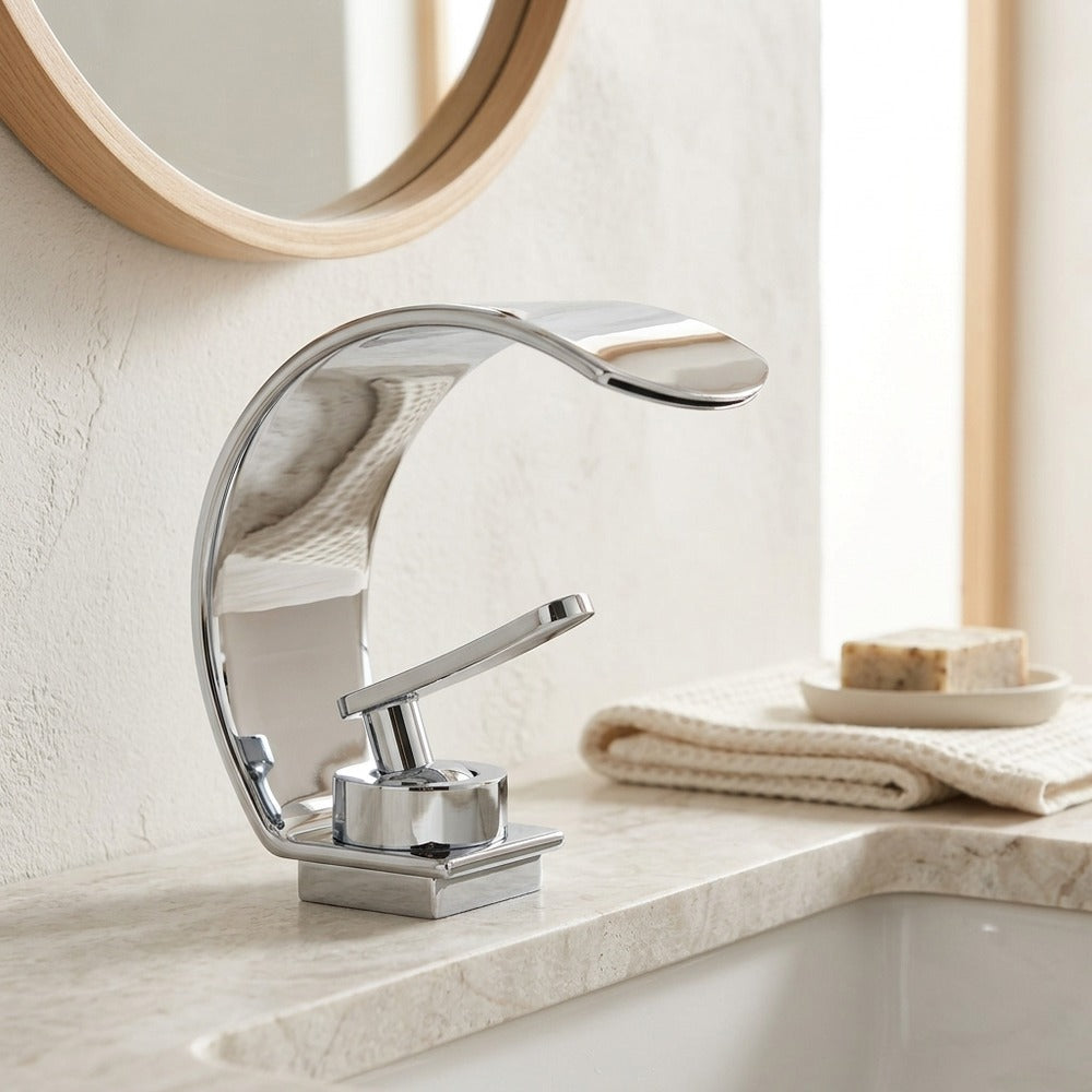 Lagomel waterfall single-hole bathroom faucet, set in a Modern/Minimalist bathroom