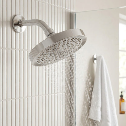 Lagomel wall-mounted fixed shower head, set in a Modern/Contemporary bathroom
