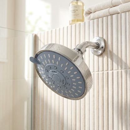 Lagomel wall-mounted fixed shower head, set in a Modern/Contemporary bathroom