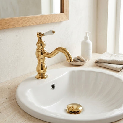 Lagomel single-hole bathroom faucet in polished gold, chrome, set in a Traditional/Classic bathroom