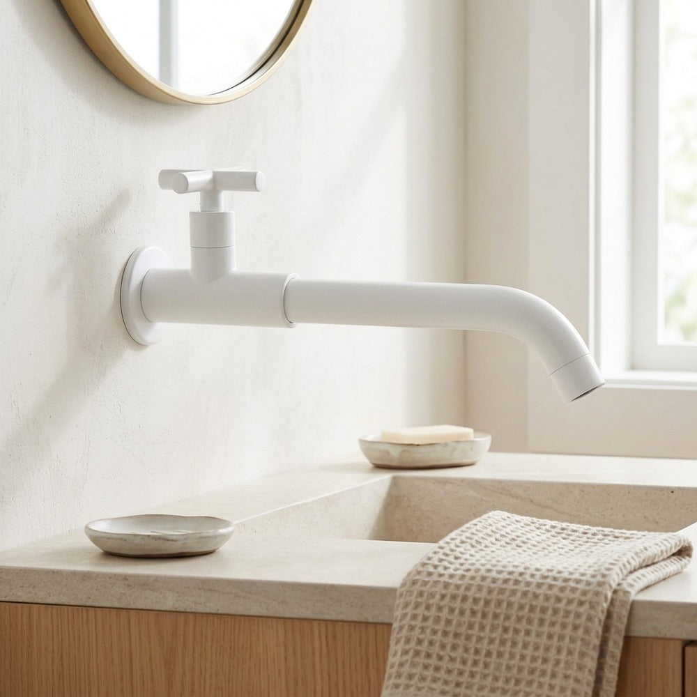 Lagomel single-handle wall-mount bathroom faucet, set in a Modern/Contemporary bathroom