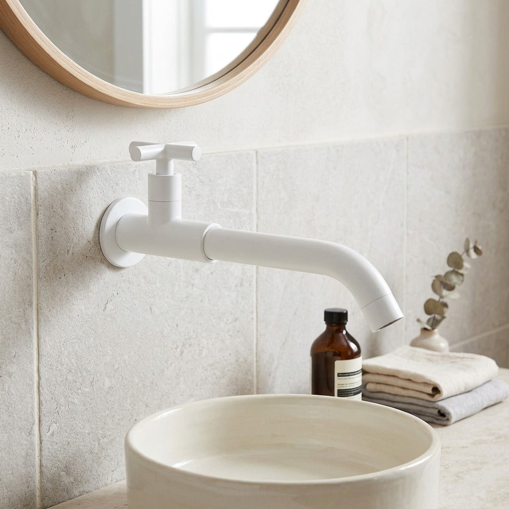 Lagomel single-handle wall-mount bathroom faucet, set in a Modern/Contemporary bathroom