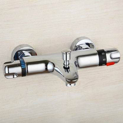 Lagomel wall-mount tub filler in chrome, set in a Minimalist bathroom