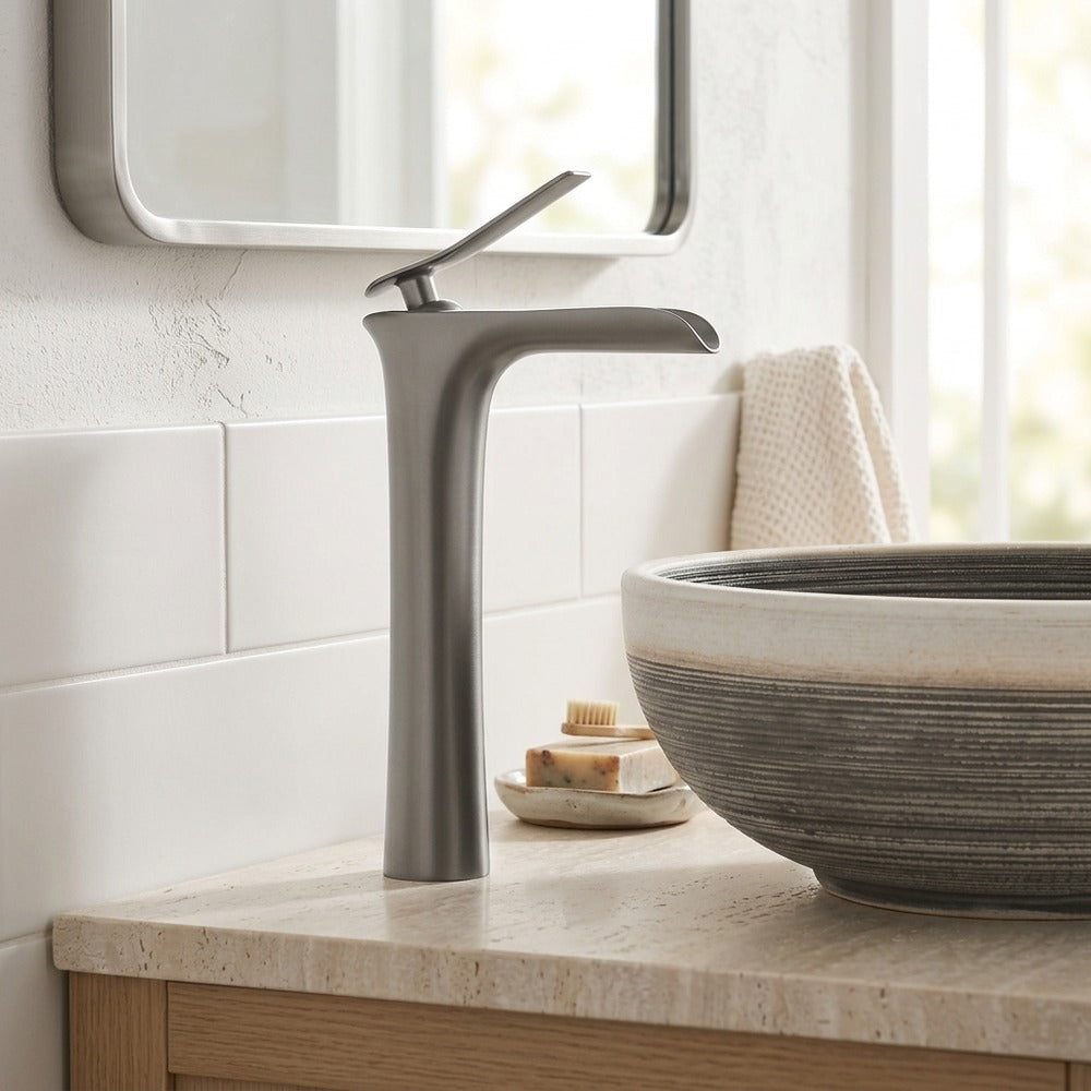 Lagomel waterfall single-handle vessel sink faucet in gunmetal, two-tone / mixed finish, polished gold, set in a Modern/Contemporary/Minimalist bathroom