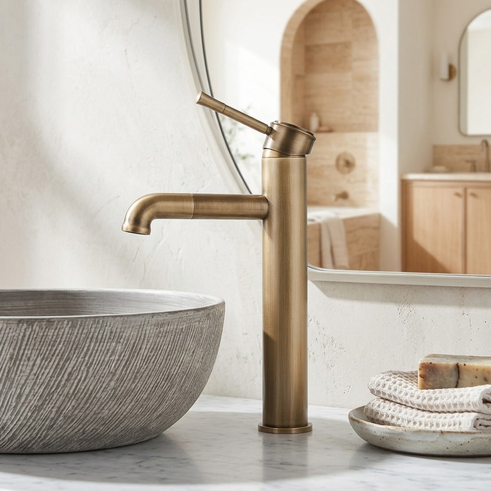 Lagomel single-hole single-handle vessel sink faucet in antique brass, matte black, set in a Vintage/Retro bathroom