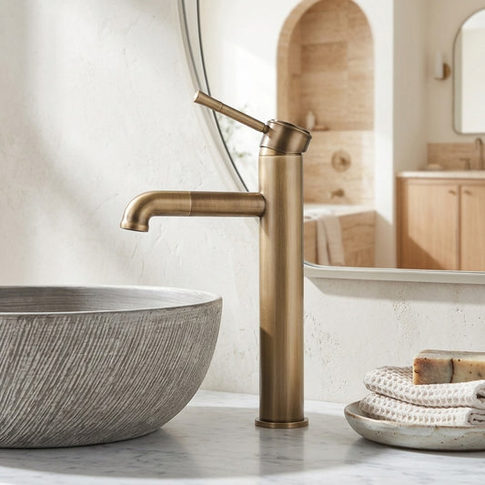 Lagomel single-hole single-handle vessel sink faucet in antique brass, matte black, set in a Vintage/Retro bathroom