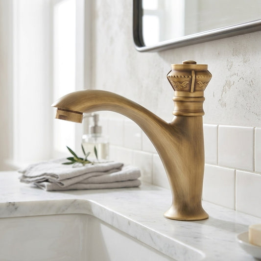 Lagomel single-hole bathroom faucet in antique brass, set in a Traditional/Classic/Vintage/Retro bathroom