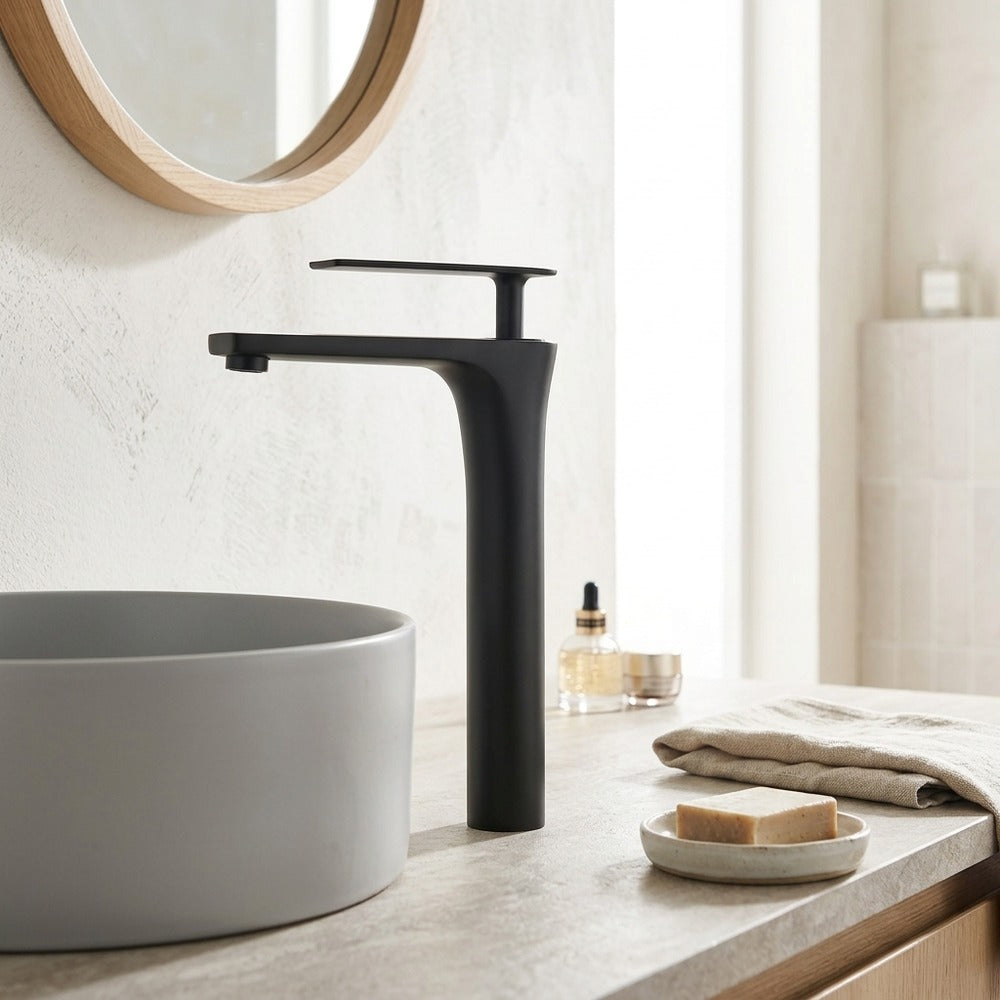 Lagomel single-hole single-handle vessel sink faucet, set in a Modern/Minimalist/Contemporary bathroom