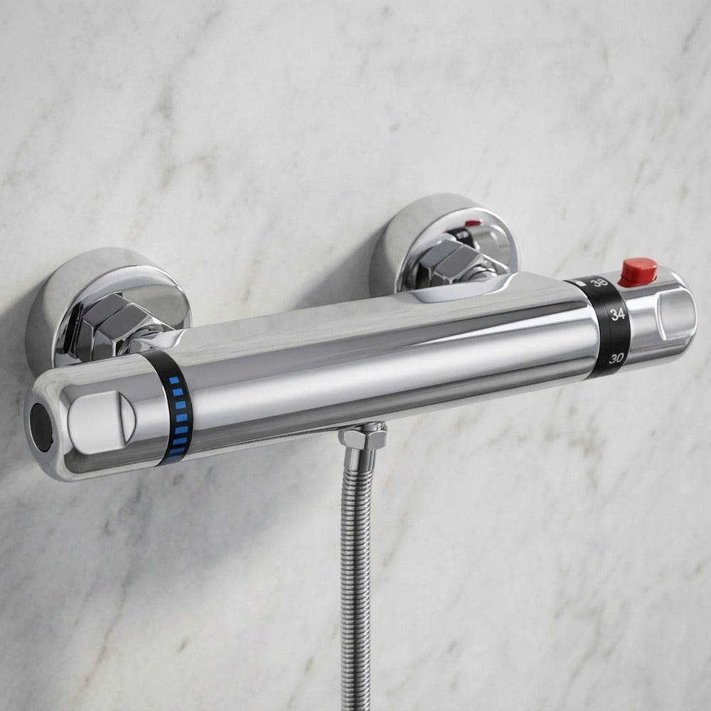 Lagomel wall-mounted shower valve in chrome, set in a Contemporary bathroom