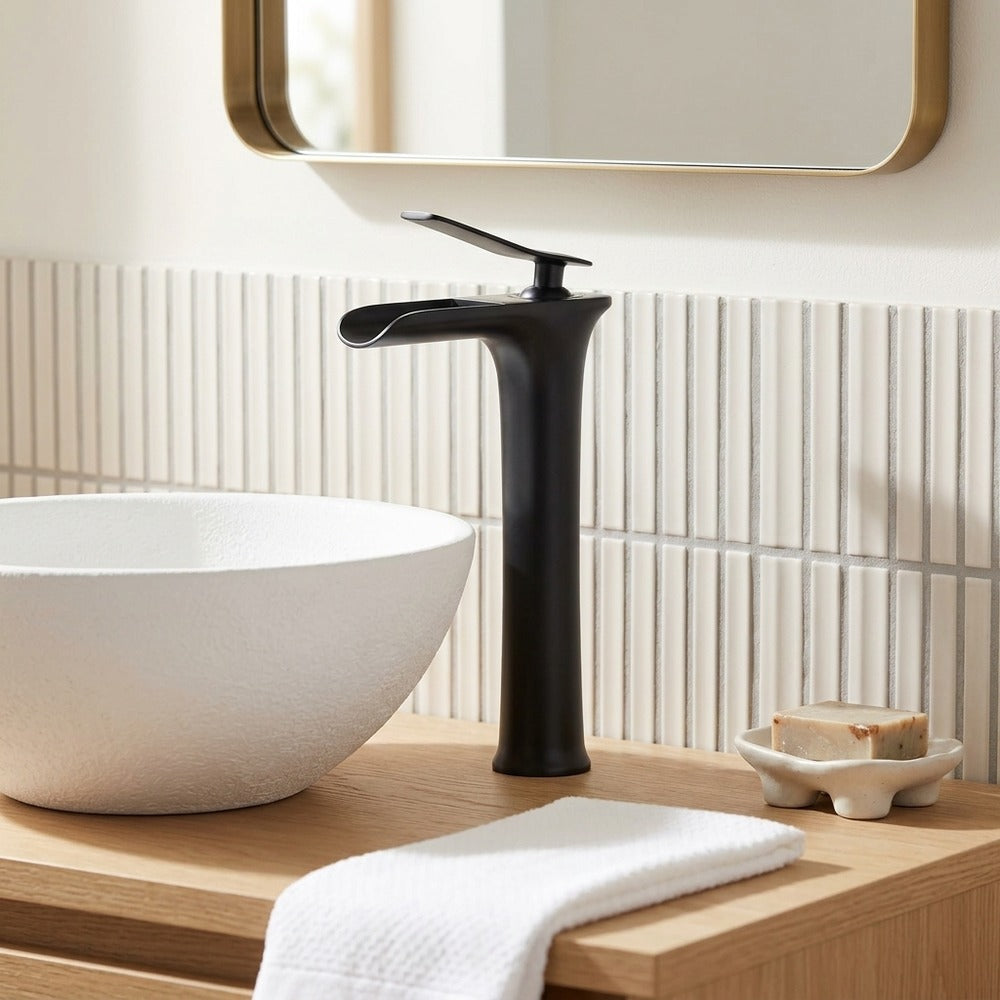 Lagomel single-hole waterfall vessel sink faucet, set in a Modern/Contemporary bathroom