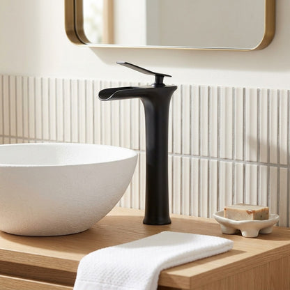 Lagomel single-hole waterfall vessel sink faucet, set in a Modern/Contemporary bathroom