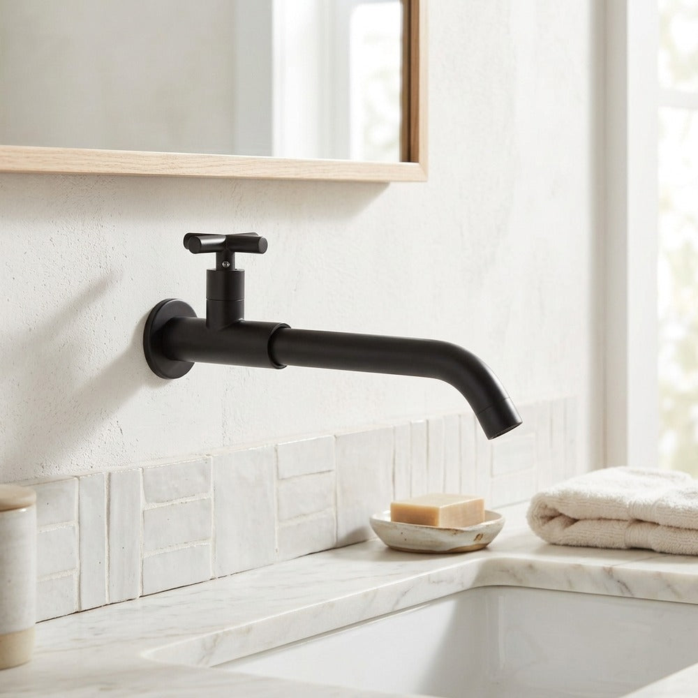 Lagomel single-hole wall-mount bathroom faucet, set in a Traditional/Classic bathroom