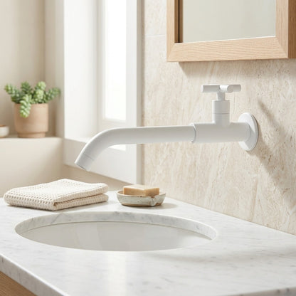 Lagomel single-hole wall-mount bathroom faucet, set in a Traditional/Classic bathroom