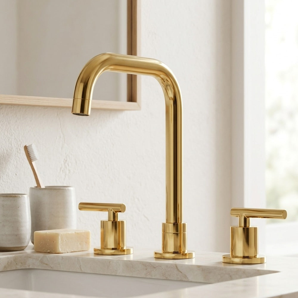 Lagomel widespread bathroom faucet in polished gold, chrome, set in a Modern/Minimalist/Contemporary bathroom