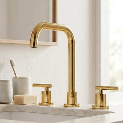 Lagomel widespread bathroom faucet in polished gold, chrome, set in a Modern/Minimalist/Contemporary bathroom