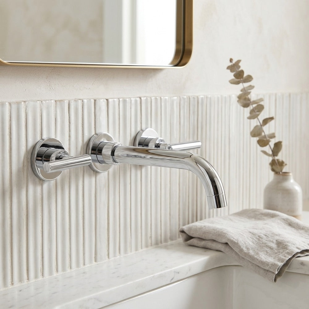 Lagomel double-handle wall-mount bathroom faucet, set in a Modern/Contemporary bathroom