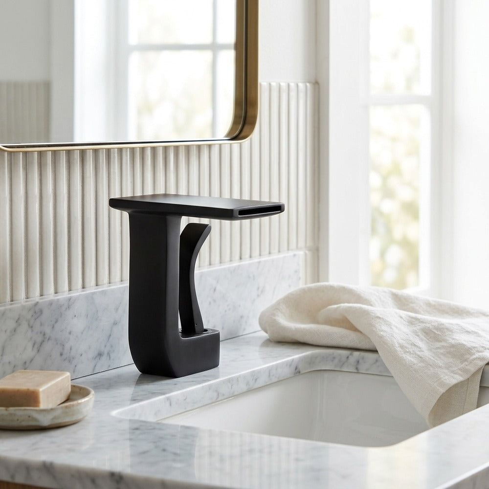 Lagomel single-hole waterfall faucet and drain set, set in a Modern/Contemporary bathroom