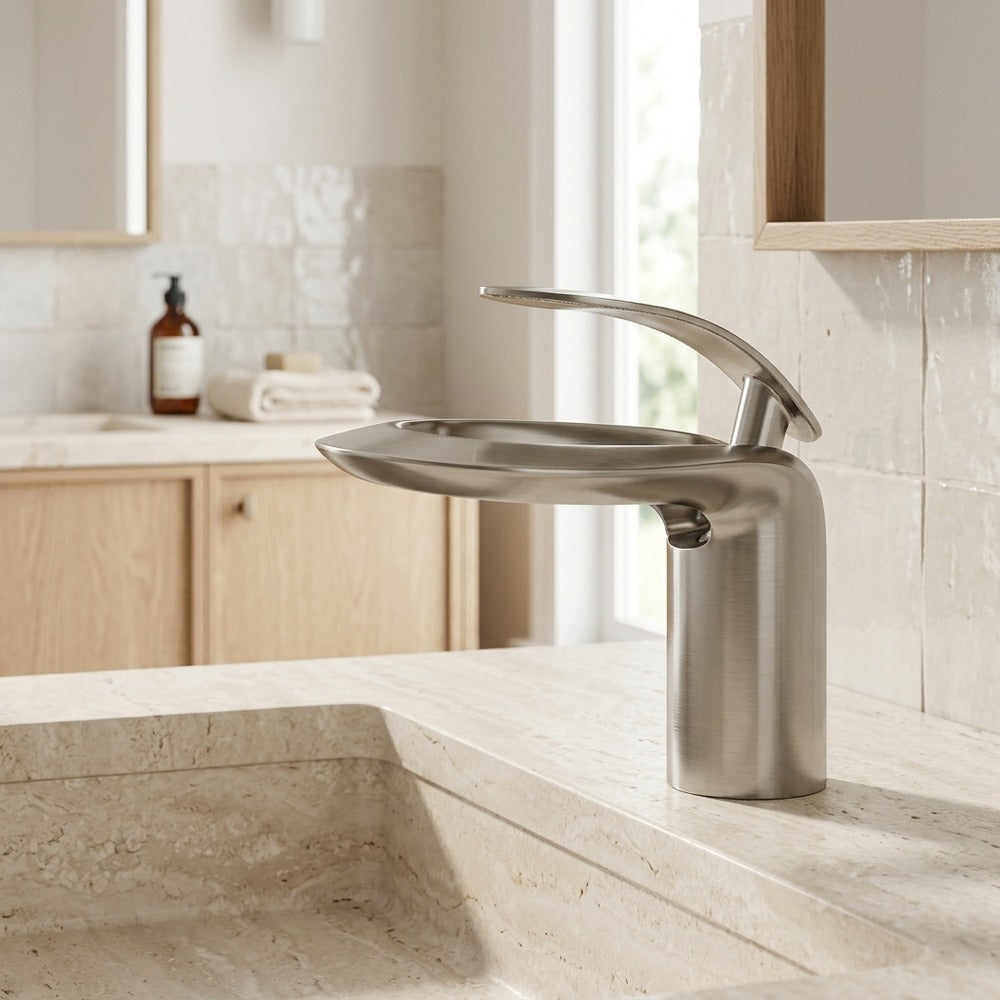 Lagomel waterfall single-hole bathroom faucet, set in a Modern/Minimalist bathroom