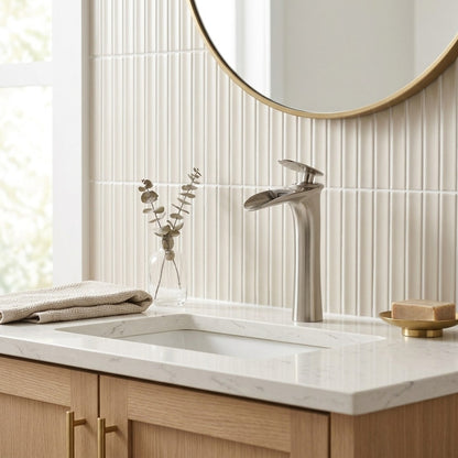 Lagomel single-hole waterfall vessel sink faucet, set in a Modern/Contemporary bathroom