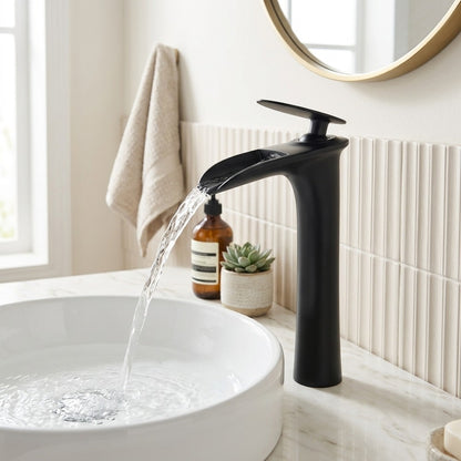 Lagomel single-hole waterfall vessel sink faucet, set in a Modern/Contemporary bathroom