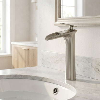 Lagomel single-hole waterfall vessel sink faucet, set in a Modern/Contemporary bathroom