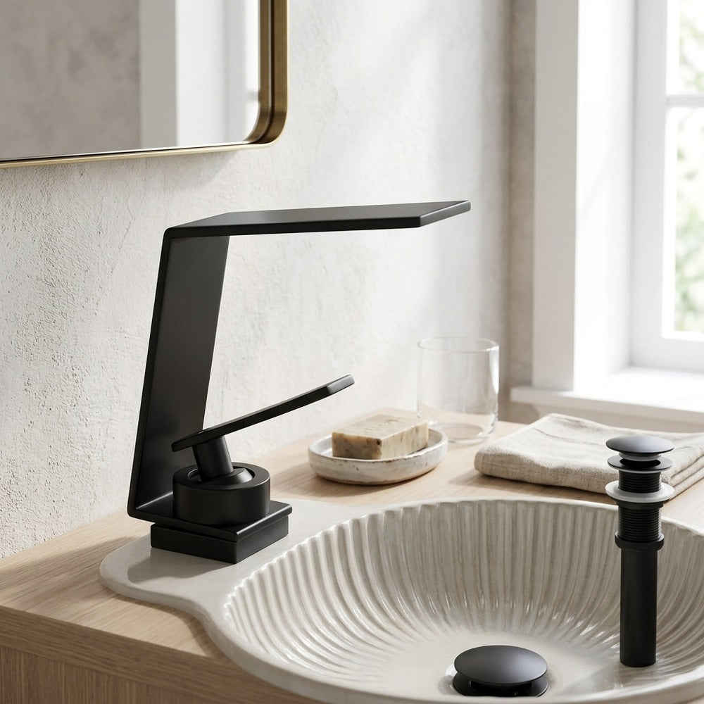 Lagomel single-hole waterfall faucet and drain set, set in a Modern/Contemporary bathroom