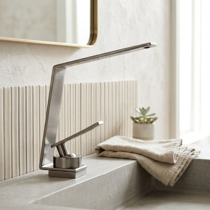 Lagomel single-hole waterfall faucet and drain set, set in a Modern/Contemporary bathroom