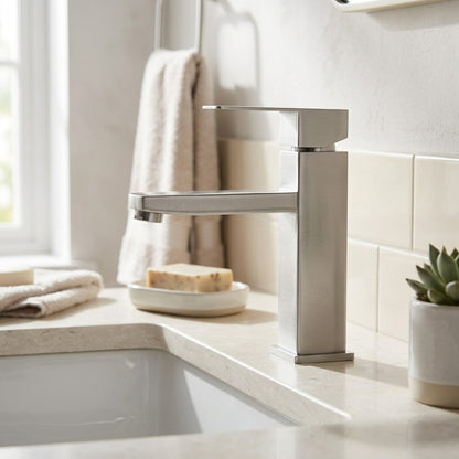 Lagomel single-hole bathroom faucet in brushed nickel, set in a Modern/Contemporary bathroom