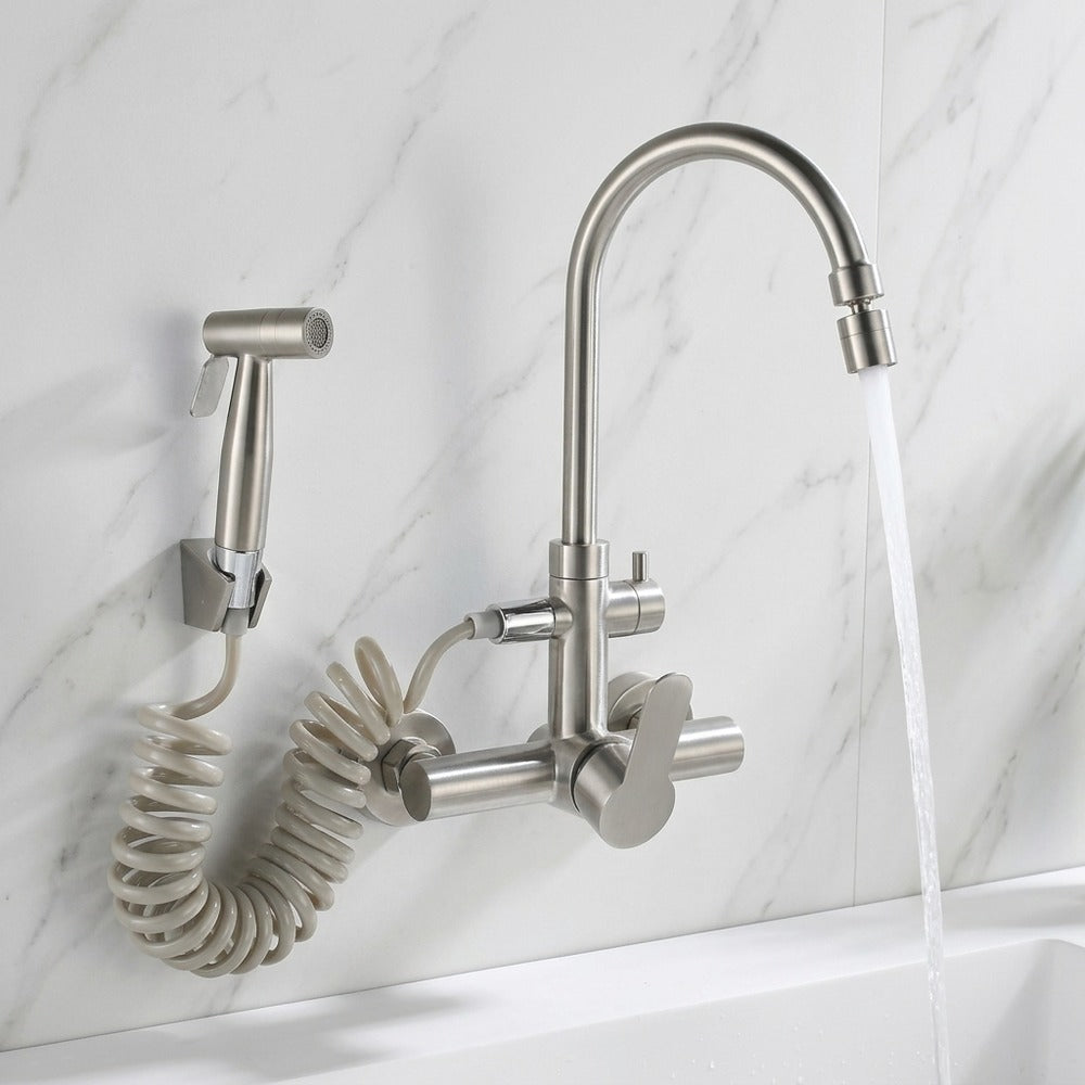 Lagomel single-handle wall-mount kitchen faucet in brushed nickel, set in a Modern/Contemporary kitchen