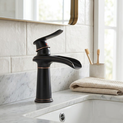 Lagomel waterfall single-hole bathroom faucet, set in a Modern/Minimalist bathroom