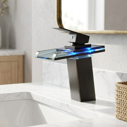 Lagomel waterfall single-hole bathroom faucet, set in a Modern/Minimalist bathroom