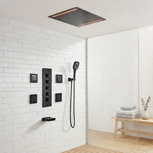 Lagomel wall-mounted waterfall tub and shower system in matte black, set in a Contemporary/Modern bathroom