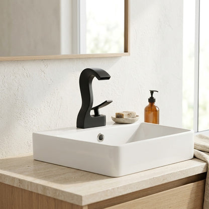 Lagomel waterfall single-hole bathroom faucet, set in a Modern/Minimalist bathroom