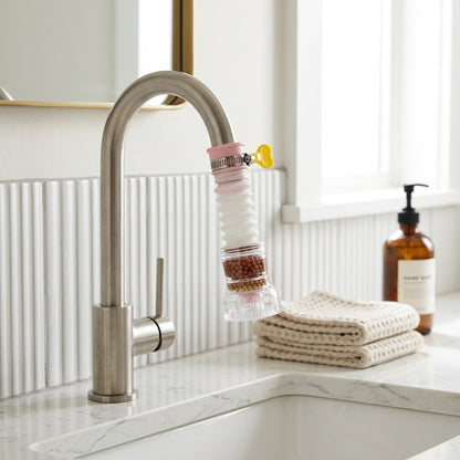 Lagomel faucet water filter, set in a Modern bathroom