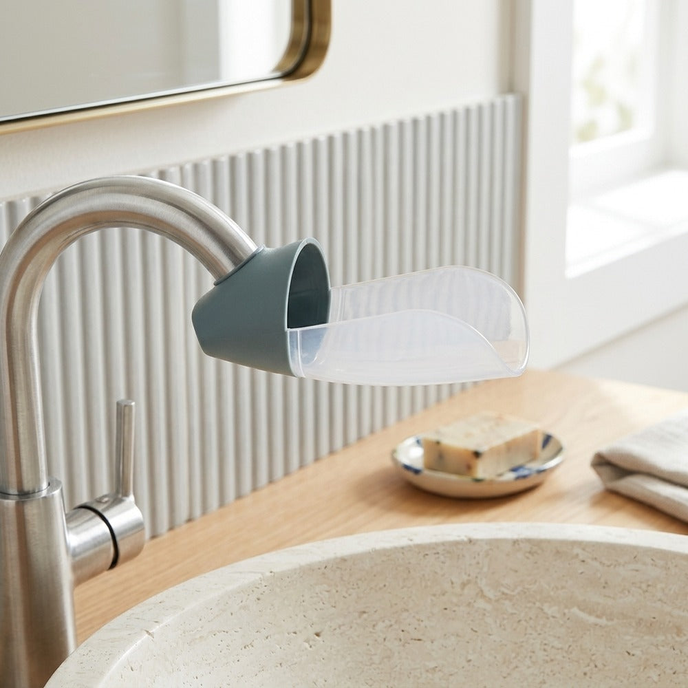 Lagomel faucet water filter, set in a Modern bathroom