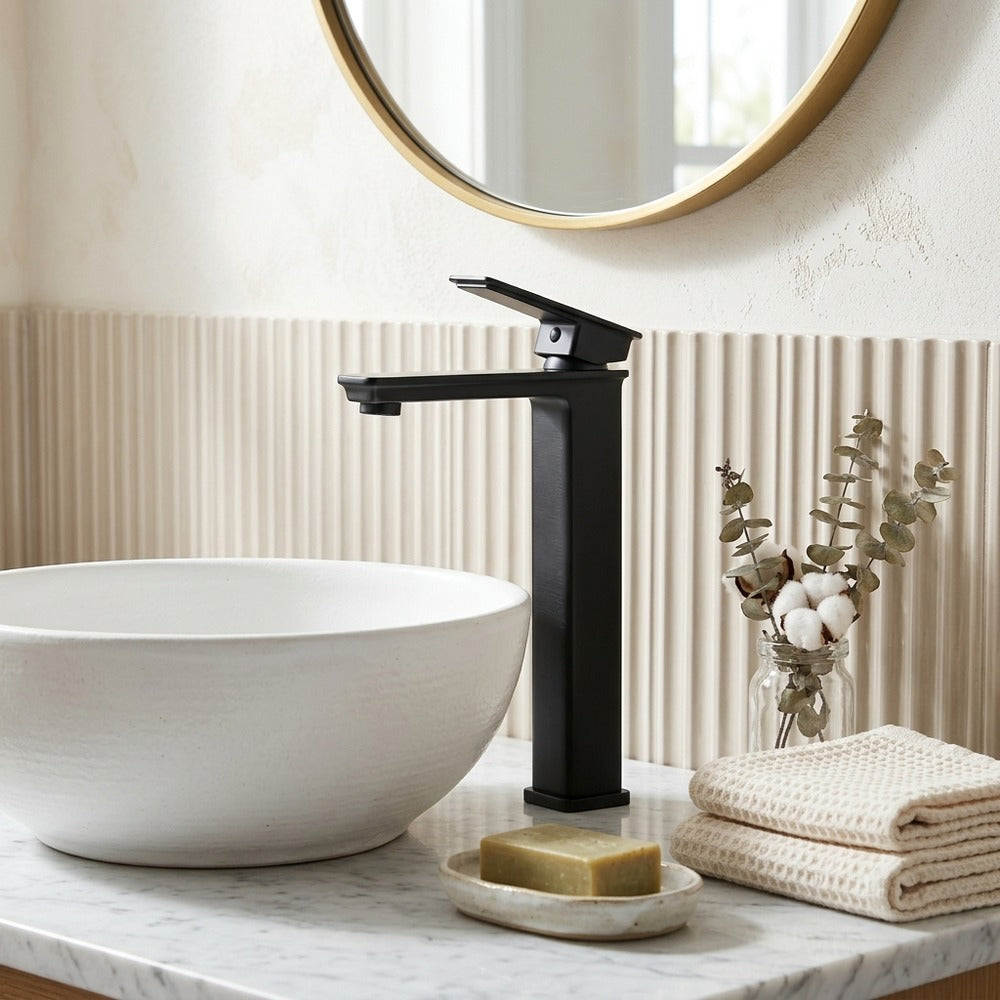 Lagomel single-handle vessel sink faucet in matte black, chrome, oil-rubbed bronze, set in a Contemporary bathroom