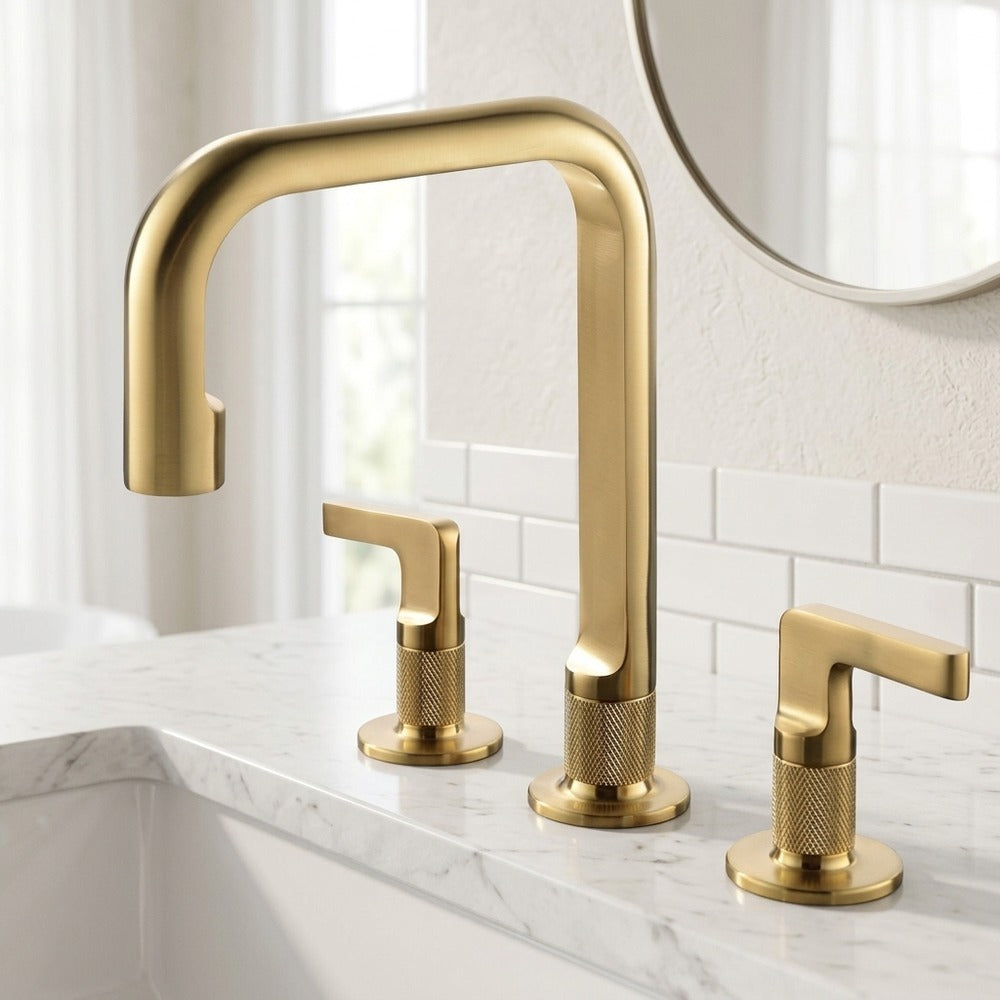 Lagomel two-handle widespread bathroom faucet in brushed gold, gunmetal, set in a Modern/Contemporary bathroom