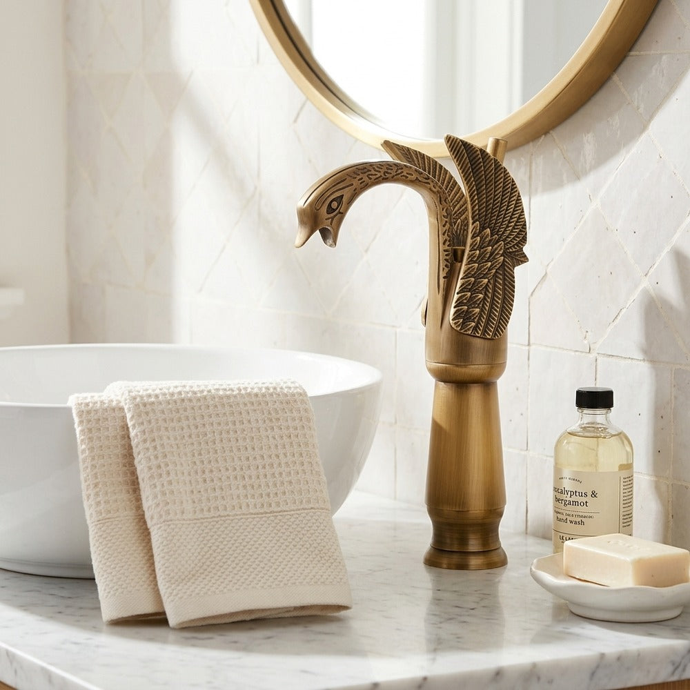 Lagomel single-hole single-handle vessel sink faucet in antique brass, brushed nickel, two-tone / mixed finish, matte, set in a Traditional/Classic/Vintage/Retro bathroom