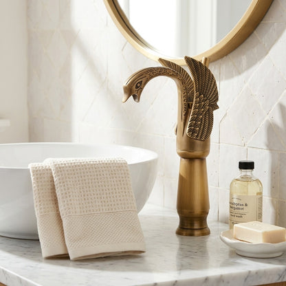 Lagomel single-hole single-handle vessel sink faucet in antique brass, brushed nickel, two-tone / mixed finish, matte, set in a Traditional/Classic/Vintage/Retro bathroom